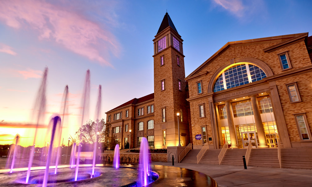 Harrison building entrance and fountain with purple uplights